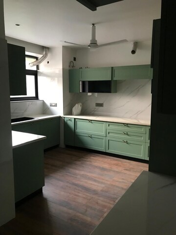 Kitchen in 5 BHK Villa at Unitech Uniworld Resorts-The Residences, Sector 33 – for Sale