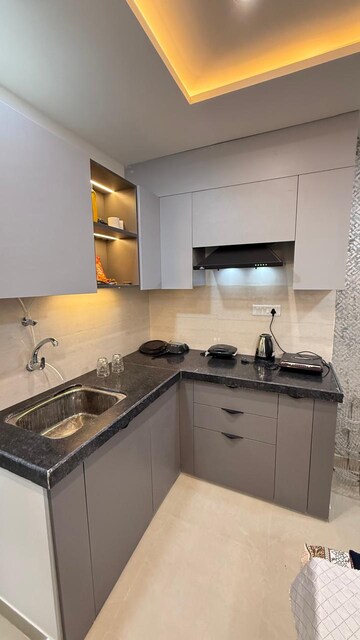 Kitchen in Studio Apartment at Okay Plus Solitaire Suites, Ramnagariya – for Rent
