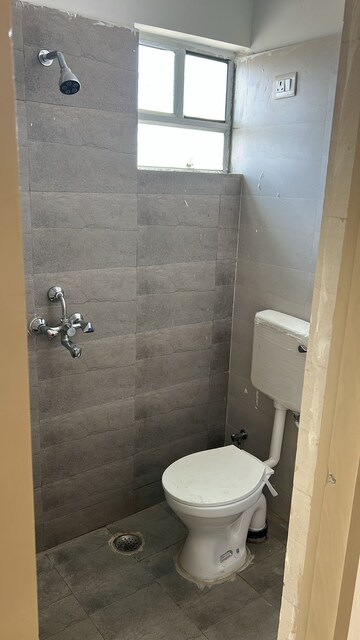 Bathroom in 2 BHK Apartment at Ravi Surya Residency, Gandhi Path – for Rent