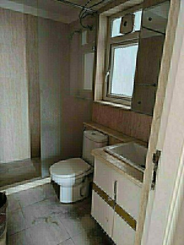 Bathroom in 2 BHK Apartment at Signature Global Orchard Avenue, Sector 93 – for Sale