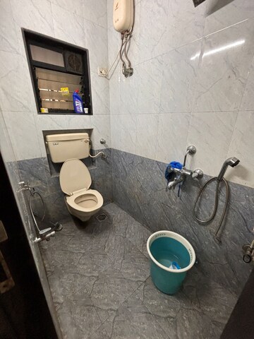 Bathroom in 2 BHK Apartment at Neel Orchid CHS, Khanda Colony – for Rent