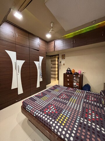 Bedroom in 2 BHK Apartment at Neel Orchid CHS, Khanda Colony – for Rent