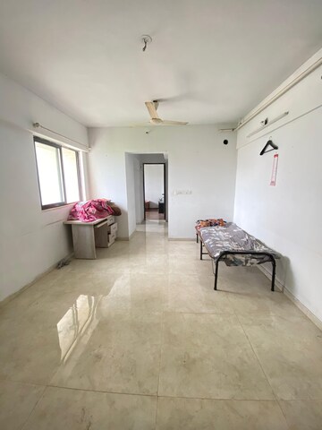Living Room in 1 BHK Apartment at Lodha Palava Downtown, Dombivli East – for Rent