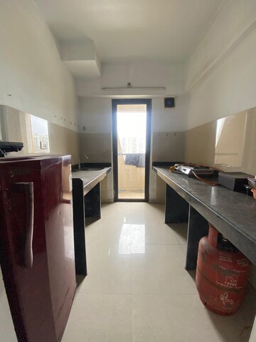 Kitchen in 1 BHK Apartment at Lodha Palava Downtown, Dombivli East – for Rent