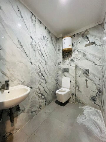 Bathroom in 3 BHK Builder Floor at Freedom Fighters Enclave – for Rent