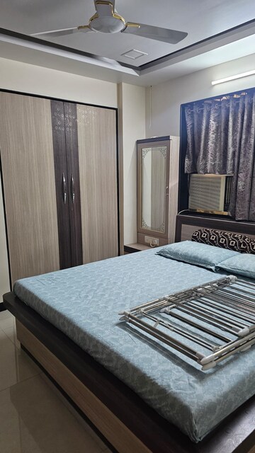 Bedroom in 2 BHK Apartment at Agrasen Tower CHS, Khopat – for Sale