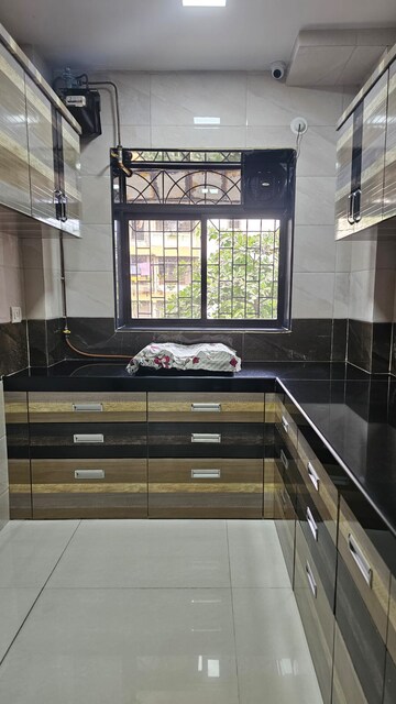 Kitchen in 2 BHK Apartment at Agrasen Tower CHS, Khopat – for Sale
