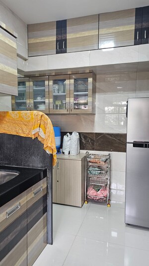 Kitchen in 2 BHK Apartment at Agrasen Tower CHS, Khopat – for Sale