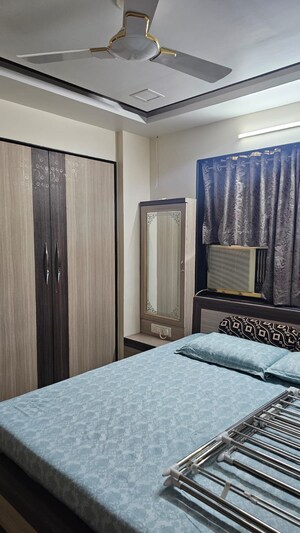 Bedroom in 2 BHK Apartment at Agrasen Tower CHS, Khopat – for Sale