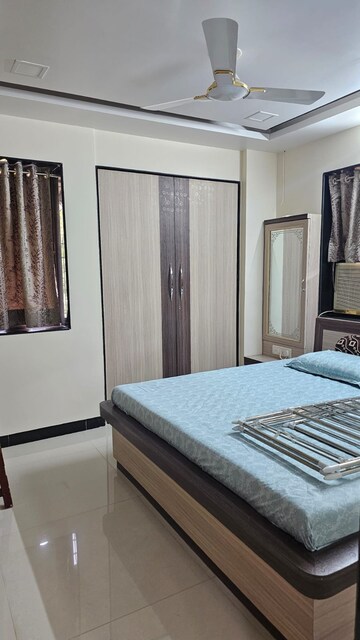 Bedroom in 2 BHK Apartment at Agrasen Tower CHS, Khopat – for Sale