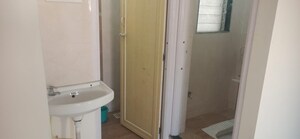 Bathroom in 1 BHK Apartment at Raunak Unnathi Woods Phase 7 A And B, Ghodbunder Road – for Sale