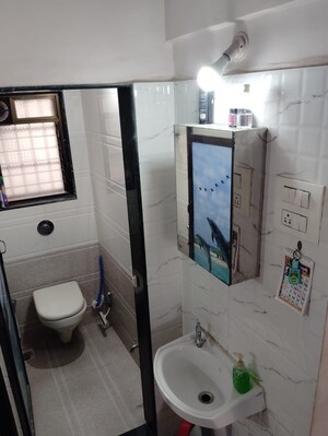 Master Bedroom in 1 BHK Apartment at Puraniks Kavya Dhara CHS, Dhokali – for Sale