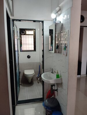 Bathroom in 1 BHK Apartment at Puraniks Kavya Dhara CHS, Dhokali – for Sale