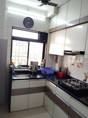 Kitchen in 1 BHK Apartment at Puraniks Kavya Dhara CHS, Dhokali – for Sale