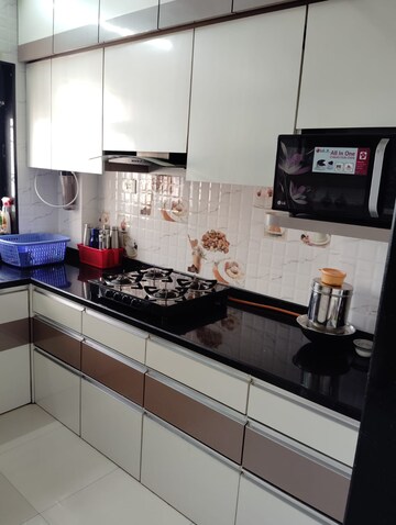 Kitchen in 1 BHK Apartment at Puraniks Kavya Dhara CHS, Dhokali – for Sale