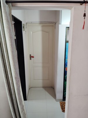 Building Lobby in 1 BHK Apartment at Puraniks Kavya Dhara CHS, Dhokali – for Sale