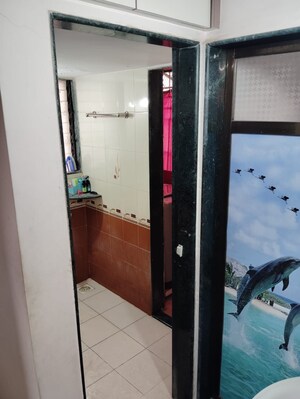 Building Lobby in 1 BHK Apartment at Puraniks Kavya Dhara CHS, Dhokali – for Sale