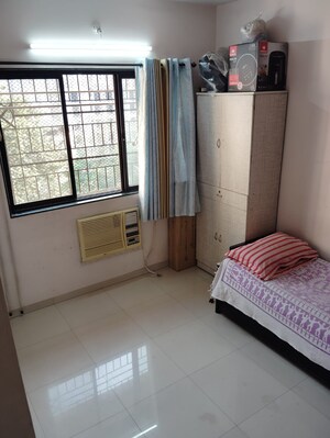 Bedroom in 1 BHK Apartment at Puraniks Kavya Dhara CHS, Dhokali – for Sale