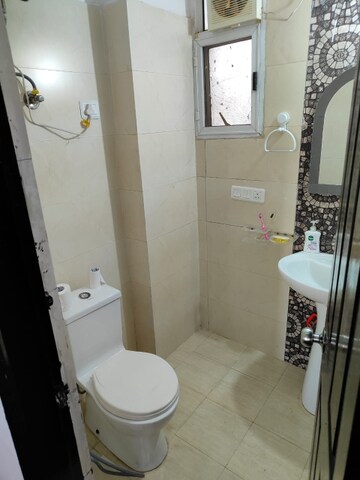 Bathroom in 2 BHK Apartment at Prateek Wisteria, Sector 77 – for Rent