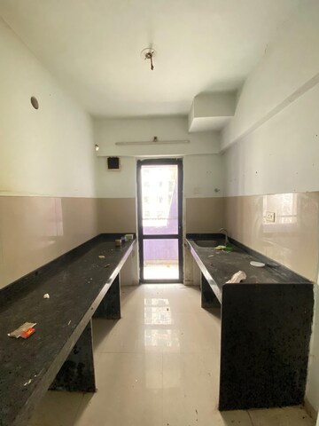 Kitchen in 1.5 BHK Apartment at Lodha Palava City Lakeshore Greens, Dombivli East – for Rent