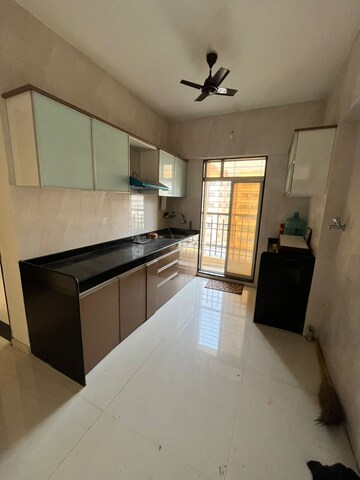 Kitchen in 2 BHK Apartment at Agarwal Paramount, Virar West – for Rent