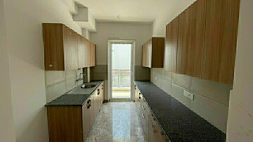 Kitchen in 2 BHK Apartment at Signature Global Orchard Avenue, Sector 93 – for Sale