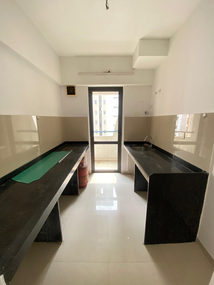 Kitchen, lodha-palava-city-lakeshore-greens 1 Bedroom 720 Sq.Ft. Apartment In Dombivli East Thane 8783855