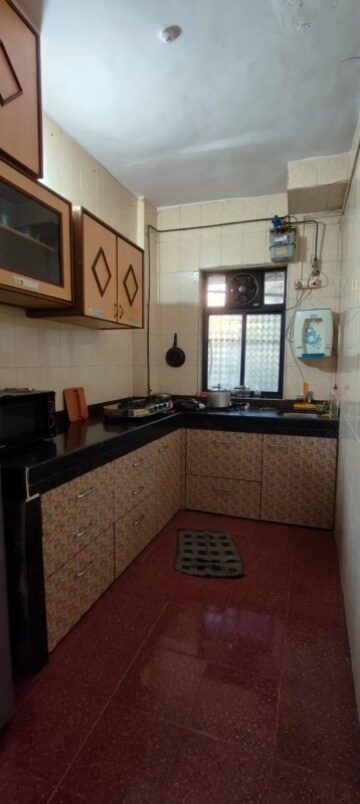 Kitchen in 2 BHK Apartment at Soniya CHS, Sector 4a Kopar Khairane – for Rent