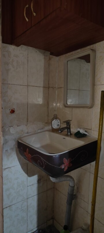Bathroom in 2 BHK Apartment at Soniya CHS, Sector 4a Kopar Khairane – for Rent