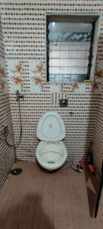 Bathroom in 2 BHK Apartment at Soniya CHS, Sector 4a Kopar Khairane – for Rent