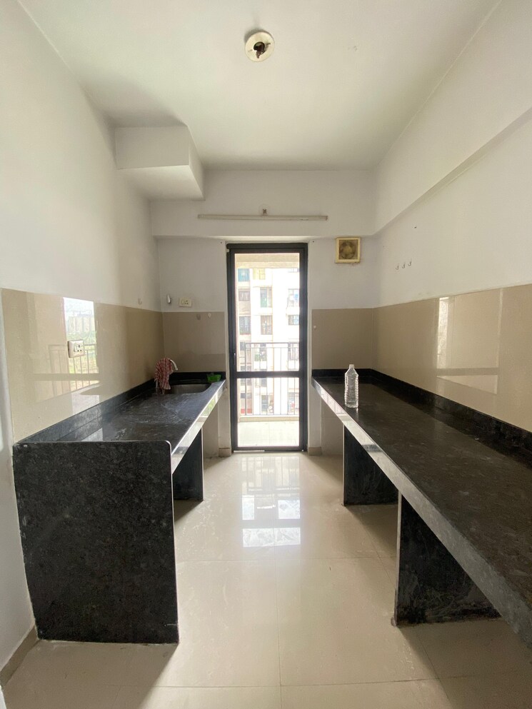 Kitchen, lodha-palava-city-lakeshore-greens 1 Bedroom 720 Sq.Ft. Apartment In Dombivli East Thane 8783984