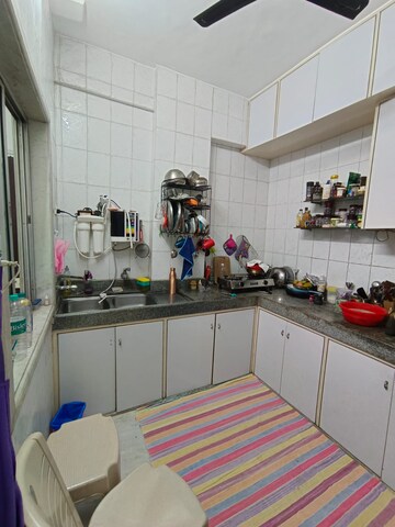 Kitchen in 1 BHK Apartment at Daulat Shirin CHS, Colaba – for Rent