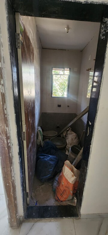 Bathroom in 2 BHK Apartment at Joshi Amar Vaishali CHS, Naupada – for Sale