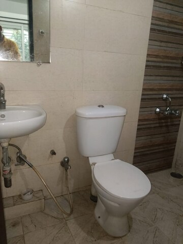Bathroom in 1 BHK Apartment at Spring Grove Uno Society, Kandivali East – for Rent