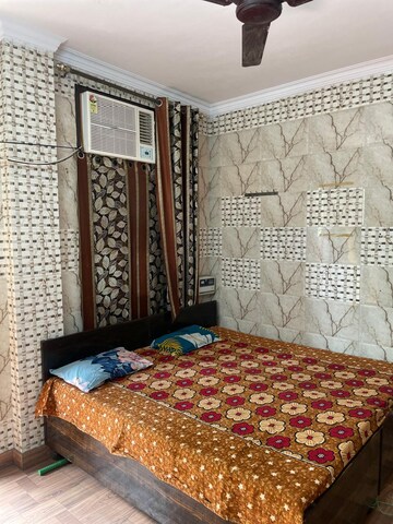 Bedroom in 3 BHK Builder Floor at Rajouri Garden – for Rent