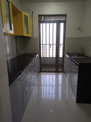 Kitchen in 2 BHK Apartment at Kalpataru Immensa, Kolshet Road – for Rent