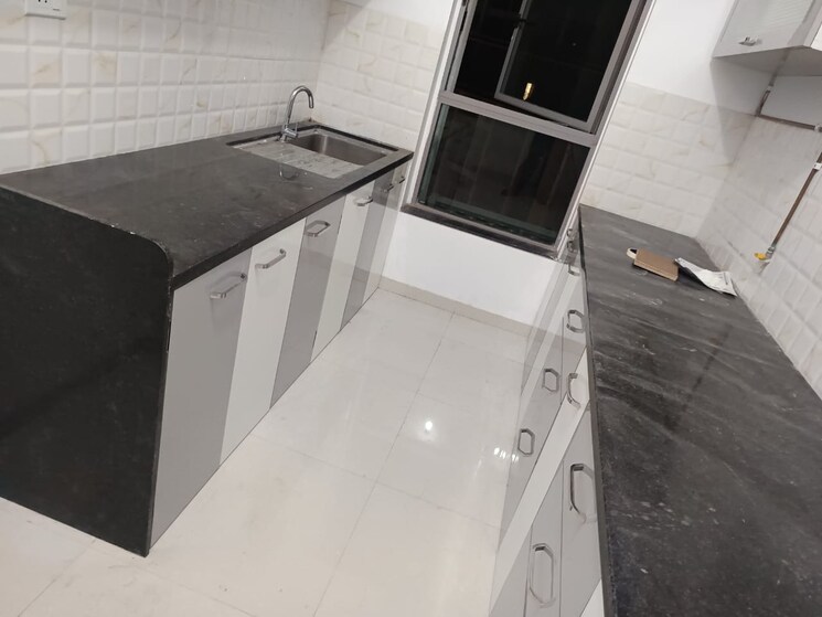 Kitchen, kalpataru-immensa 2 Bedroom 599 Sq.Ft. Apartment In Kolshet Road Thane 8784223