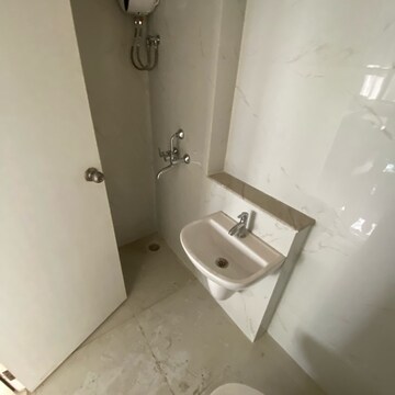 Bathroom in 1.5 BHK Apartment at Runwal Gardens Phase 2, Kalyan Shilphata Road – for Rent