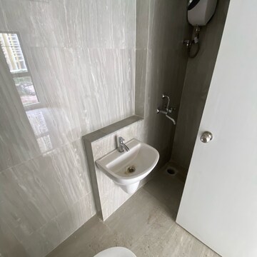 Bathroom in 1.5 BHK Apartment at Runwal Gardens Phase 2, Kalyan Shilphata Road – for Rent