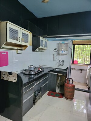 Kitchen in 2 BHK Apartment at Silvassa Vapi Road – for Sale