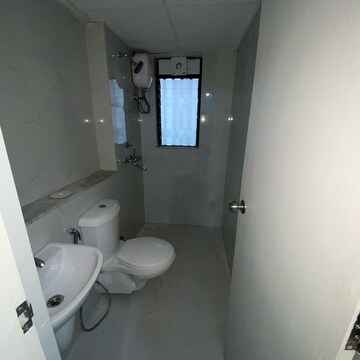 Bathroom in 1 BHK Apartment at Runwal Gardens Phase I, Kalyan Shilphata Road – for Rent