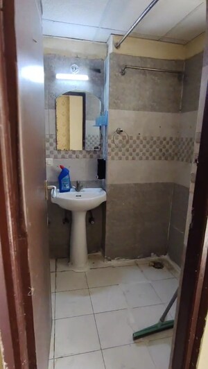Bathroom in 2 BHK Apartment at Galaxy Royale, Gaur City 2 – for Sale