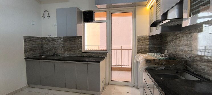 Kitchen, shapoorji-pallonji-joyville-phase-2 3 Bedroom 1692 Sq.Ft. Apartment In Sector 102 Gurgaon 8784575