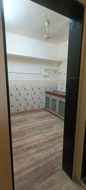 Kitchen in 1 BHK Apartment at Shankar Vijay Apartment, Rajawadi – for Rent