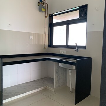 Kitchen in 1.5 BHK Apartment at Arkade Crown, Lic Colony – for Sale
