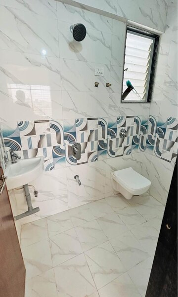 Bathroom in 2 BHK Apartment at Aparna Society, Dombivli West – for Rent
