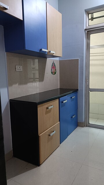 Kitchen in 2 BHK Apartment at Hiranandani Villa Grand, Ghodbunder Road – for Rent