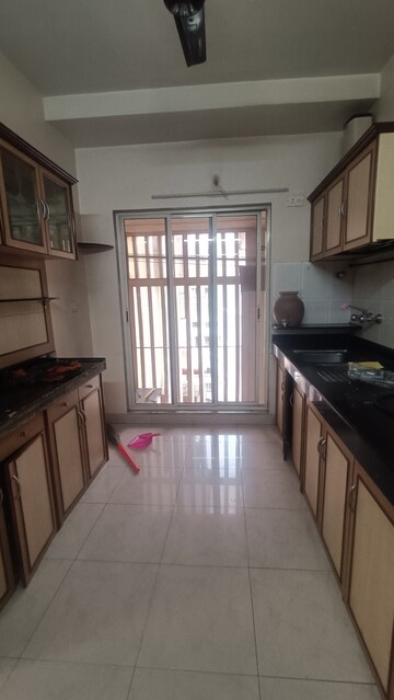 Kitchen in 3 BHK Apartment at Shridhar Smruti CHS, Borivali West – for Rent