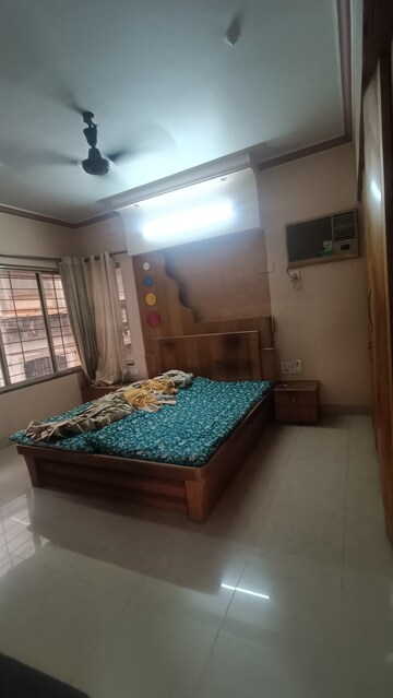 Bedroom in 3 BHK Apartment at Shridhar Smruti CHS, Borivali West – for Rent