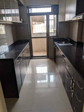 Kitchen in 2.5 BHK Apartment at Raheja Acropolis, Deonar – for Rent